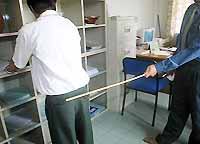 teenage boy being caned in his school in Malaysia