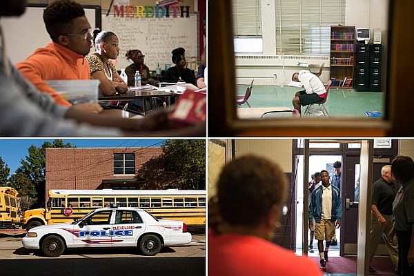 High-school students learn about tolerance; a student asleep at the Alternative Learning Center; students walk through a metal detector; police park outside Cleveland High School