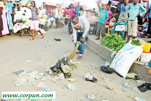 Youth sweeping market as punishment
