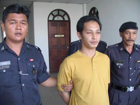 Jamaludin with police escort