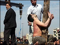 Mohammad Bijeh collapses as he is flogged before his execution